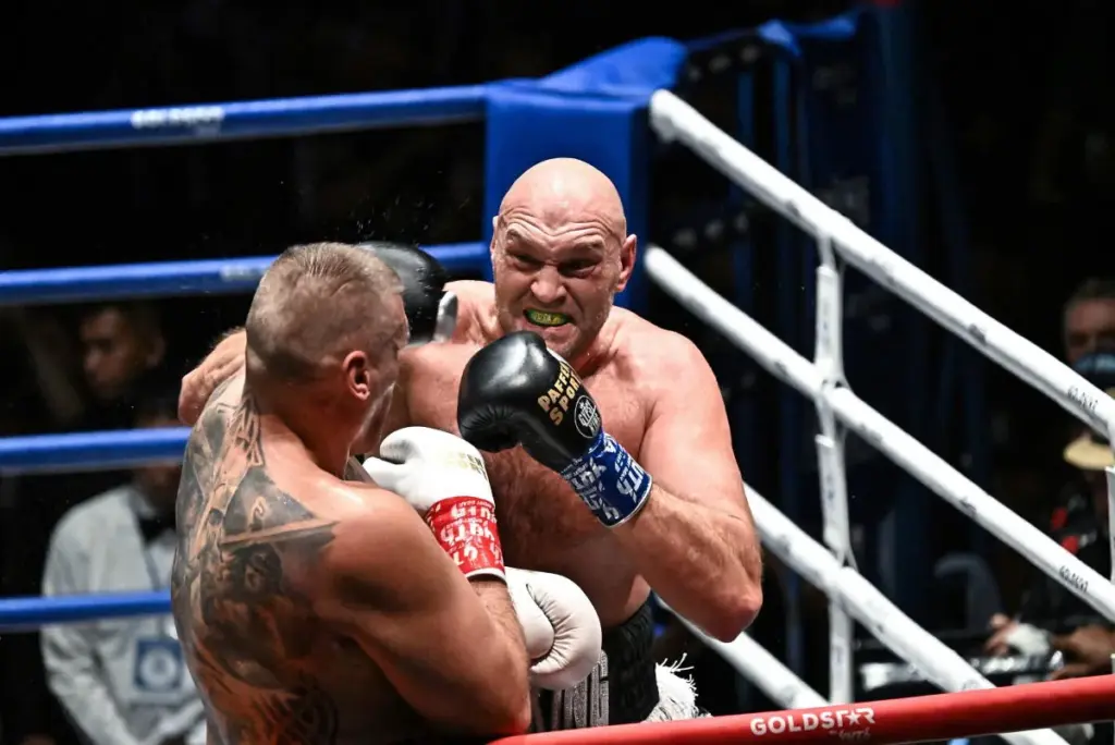 Fury wins low-key warm-up to keep Joshua fight on track